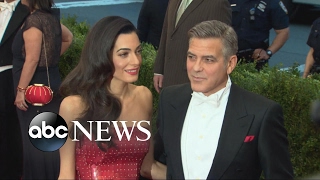 George and Amal Clooney settling into their new role as parents