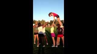 Front flip to cradle Cheerleading stunt