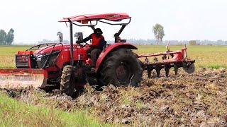 Tractor kubota plowing​ in the field,ត្រាក់ទ័រគូបូតាភ្ជួរដីនៅប្រទេសកម្ពុជា