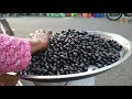 khmer jamun fruit ផ្លែព្រីងទុំខ្មែរធម្មជាតិមួយកំប៉ុងថ្លៃ១៥០០៛ទៅ២០០០៛មានលក់នៅផ្សារទូលទុំពួង