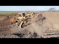 d11 bulldozer ripping rock in quarry basalt