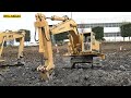 cat 245 ripping out rock in 2022