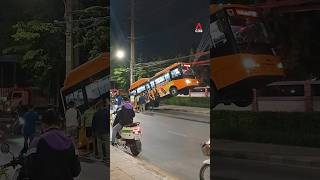 Thai bus skids off road and gets stuck in air