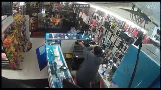 Store employee shoots two armed robbers, one killed