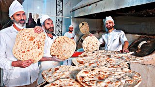 Baking the very popular Taftoon bread by a baker in Iranian bakery: Taftoon bread making video