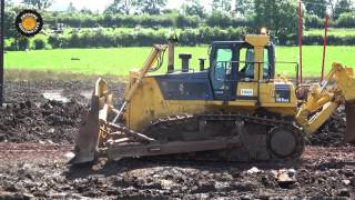 Komatsu D155AX Bulldozer building a haul road