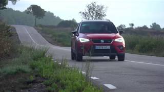 Seat Arona Driving in the country in Desire Red