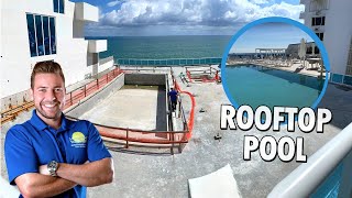 SWIMMING POOL BUILT IN THE ROOFTOP OF A HIGH END HOTEL ON THE BEACH.