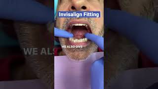 Invisalign fitting appointment, followed by use and care instructions.