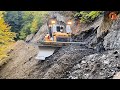 Skillful Excavator Operators are Building Roads on a Steep Mountain