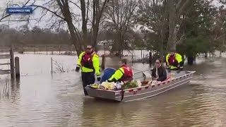 Crews rescue California couple from rain water