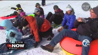 Dave Rexroth has fun sledding on a snow day!