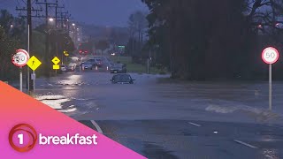 Vehicle stranded in flooded road in West Auckland