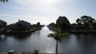 Gulf Access Condo located on the Intersecting  Canal with DEEDED BOAT DOCK