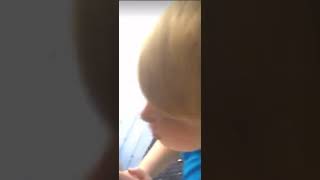 Kid breaks glass then starts crying