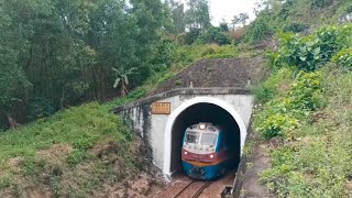 D19E locomotives pulled trains run through tunnel