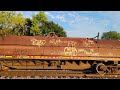 cn 2857 2938 run a westbound train with gtw box cars cnw mkt covered hoppers past vicksburg mi