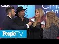 Garth Brooks And Trisha Yearwood Discuss His New Song That She's Never Heard! | CMAs 2018 | PeopleTV