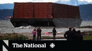 Barge beached in Vancouver’s English Bay not budging