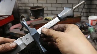 Forging a feather damascus dagger, part 2, making the guard and pommel