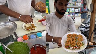 Hardworking man making unique jalebi chaat with hands - Indian Street Food