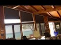 Water Views· Angled Motorized Cellular Shades ·Blackout & Light-Filtering ·Specialty Shaped Windows