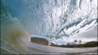 Checking out the last swell from inside the water