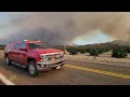 USA: Wildland firetrucks responding lights and sirens to vegetation fire 9-6-2022