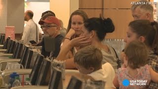 Flights resume as Delta investigates computer glitch