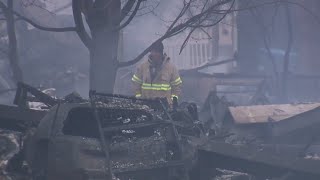 Louisville residents survey smoldering homes