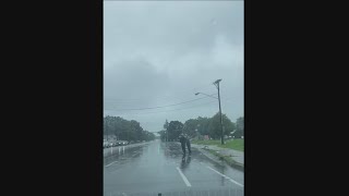 WATCH: Unknown local officer guides elderly person across Rochester roadway