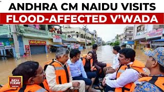 Andhra Pradesh CM Chandrababu Naidu Rides On JCB To Visit Flood-Affected Areas In Vijayawada