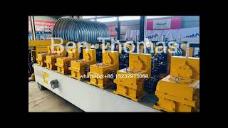 Helically corrugated metal pipes machine