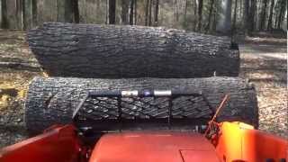 Kubota L-39 Carrying Monster Logs