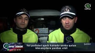 Şəmkirin yol polisləri qarlı havada yolda qalan idmançılara yardım etdi - Kəpəz TV