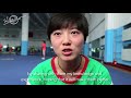 the henan junior wushu team in practice and and interview with their coach li lin lin