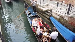 Gondola with singing Gondolier in Venice 09 July