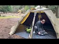 hot tent camping in the rain