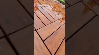 Burma teak decking, wet in the rain, remains stunning and durable. Experience unmatched resilience.