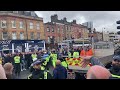 west ham fans arriving at the tottenham hotspur stadium met by spurs fans