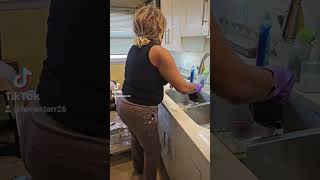 Lexie Starr Dancing while washing dishes