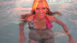 Trina Mason in the pool at sunset