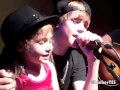 Justin Bieber brings fan on stage to sing