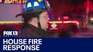 Firefighters respond to house fire in North Seattle