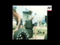 UNUSED 9 2 81 MECHANICS PREPARE CARS FOR SOUTH AFRICAN GRAND PRIX AT KYALAMI RACETRACK IN MIDRAND