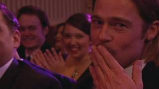 Stephen Fry makes Brad Pitt air kiss the TV audience at the BAFTAs