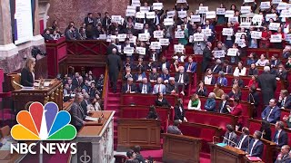 Macron’s proposed pension changes disrupted by rowdy French lawmakers