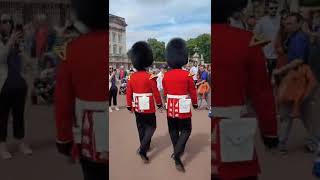 Make way. woman gets squashed between two of the queens guards #buckinghampalace