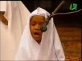 very small kid ,with very touchingl voice in recitation of the Quran