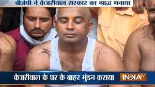 BJP Workers Shave-Off Their Hair, Protest Outside Kejriwal Residence In Delhi